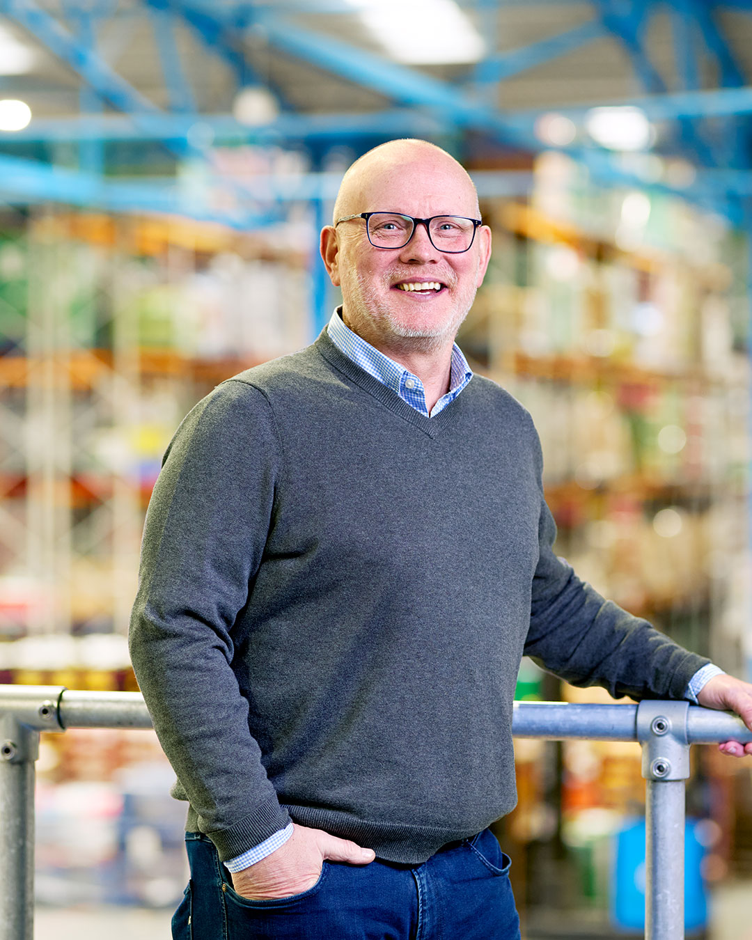 Lee Wood, Trading Director, stands in the Company Shop surplus warehouse.